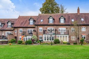 Rear looking over gardens- click for photo gallery